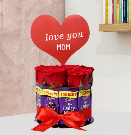 8 roses 7 dairy milk in vase